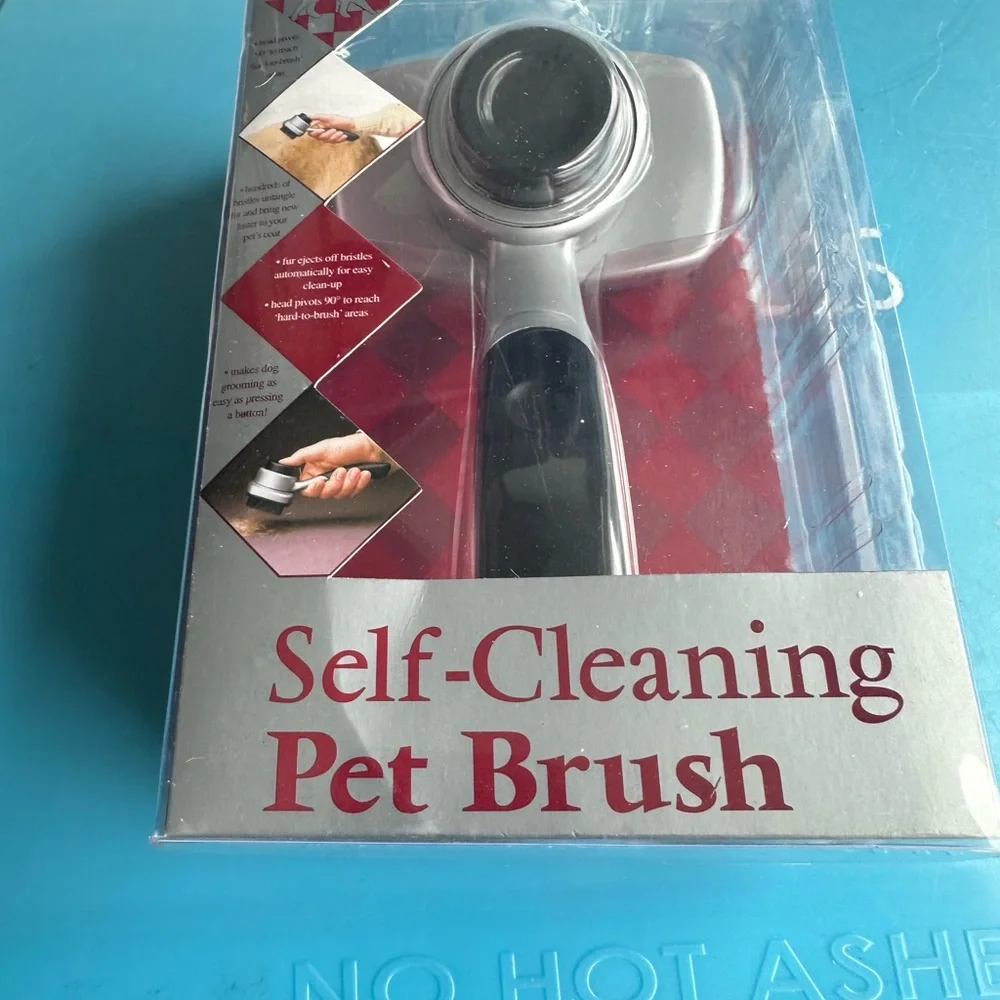 Silver and Black Self-Cleaning Pet Brush